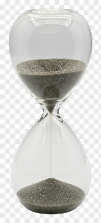 Glass hourglass with gray sand flowing.