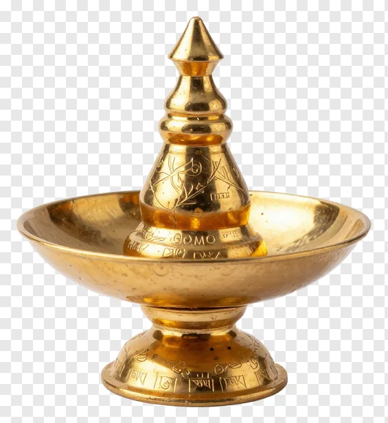 Golden kalash with tiered spire and engraved patterns.