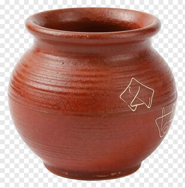 A saffron clay pot with gold stickers.