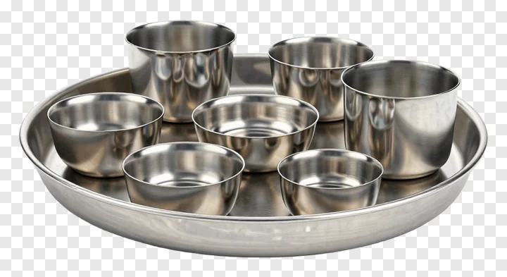 Stainless steel thali set with seven compartments.