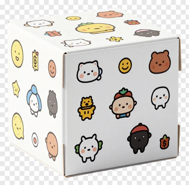 A white cube box covered in colorful cartoon stickers.