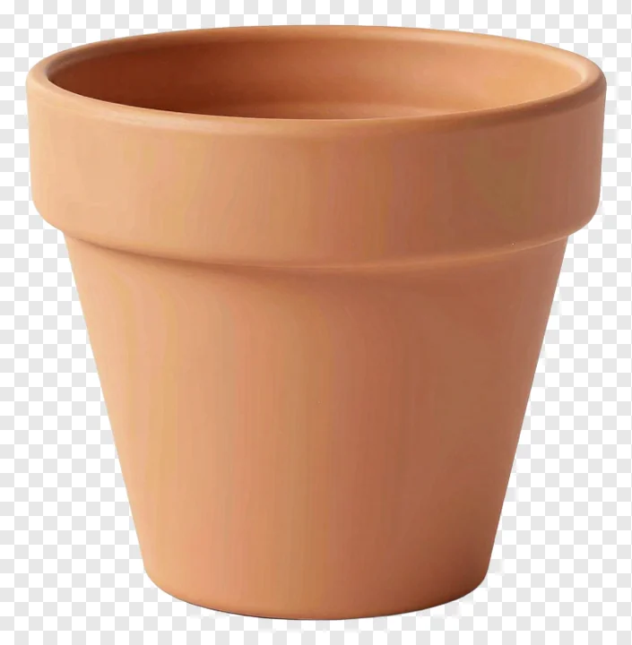 A terracotta plant pot on a white surface.