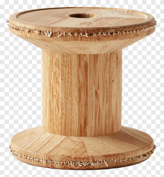 A wooden spool with frayed edges.