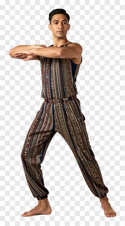 A male Garba dancer in a patterned jumpsuit.