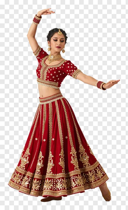 A woman in a red embroidered lehenga dancing in a traditional pose.