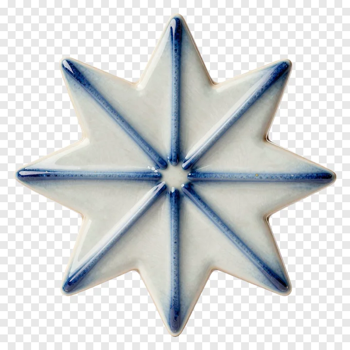 A ceramic star tile with blue glaze details.
