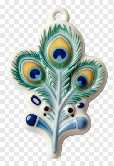 Ceramic charm shaped like a peacock feather with colorful eye patterns.