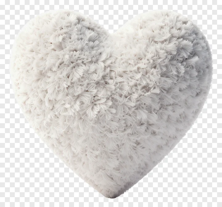 A fluffy white heart-shaped pillow.