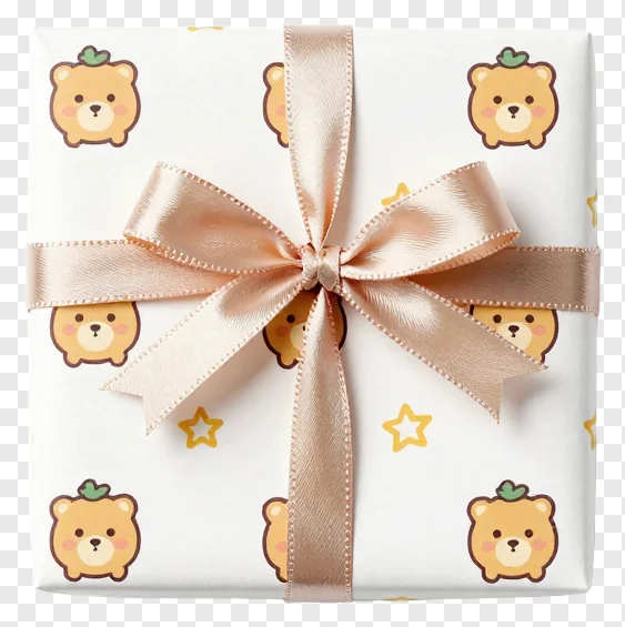 A wrapped gift box with a bear pattern and a peach bow.