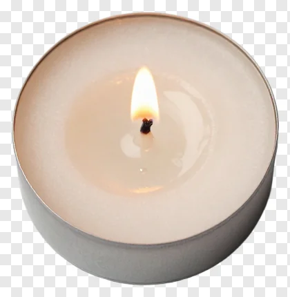 A lit tea light candle in a metallic tin.