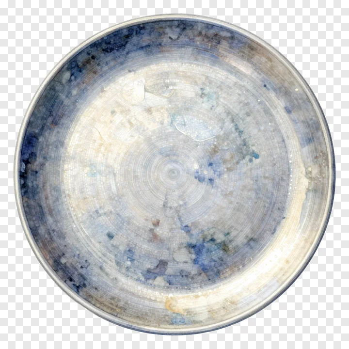 Top-down view of a silver aarti plate with blue-gray mottled patterns.
