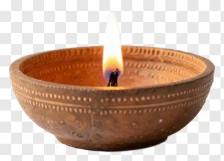 A lit terracotta diya with a warm flame.