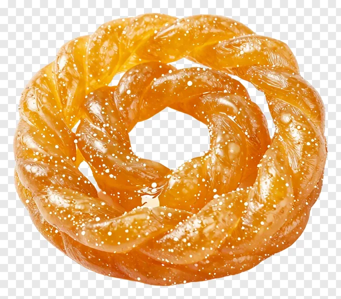 Golden twisted jalebi candy with sugar sprinkles.