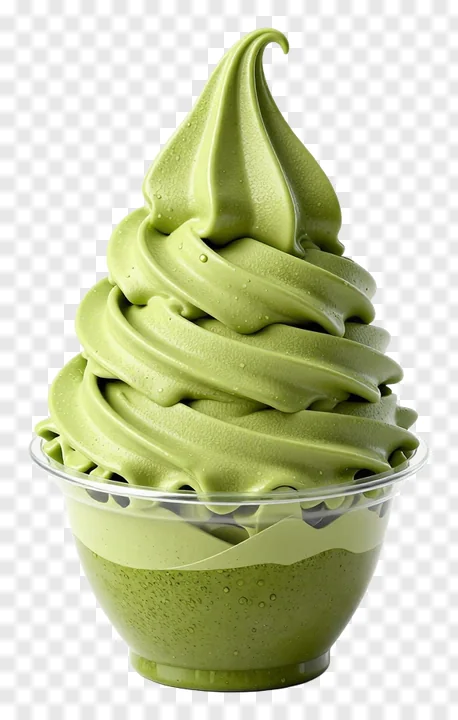 A green matcha ice cream swirl in a clear cup.