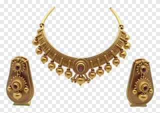 Bengali gold jewelry set with bell dangles and red stones.