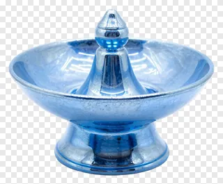 A blue glass kalash for Lakshmi puja.