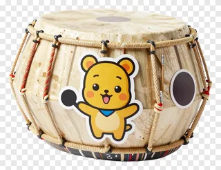 A tabla drum decorated with a cartoon bear sticker.