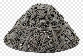 An ornate miniature sculpture of Govardhan Hill with intricate carvings.