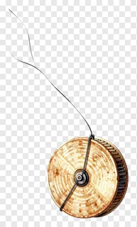A wooden kite string spool with a string extending upward.