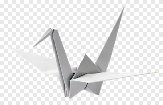 A white paper crane flying with outstretched wings.