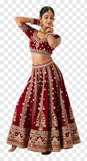 A woman dancing in a red velvet lehenga with gold embroidery.
