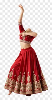 A woman in a red embroidered lehenga dancing in a leaning pose.