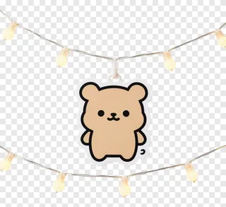 A bear-shaped ornament hanging from fairy lights.