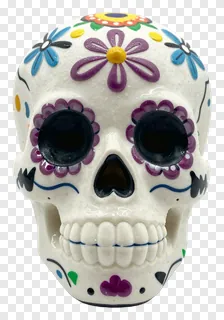 A decorated sugar skull with colorful flowers and black eye sockets.