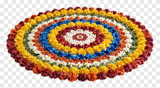 A colorful spiral kolam rangoli made of flowers.