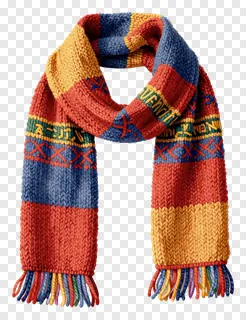 A colorful knitted scarf with fringe and patterned stripes.
