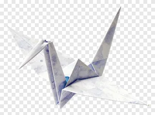 A folded paper crane with blue and white patterned paper.
