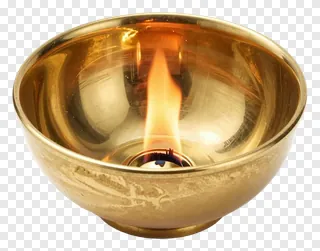 A brass oil lamp with a single flame burning inside.