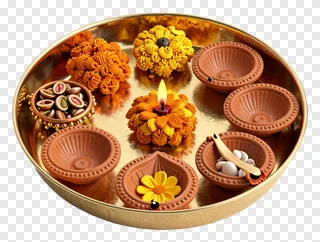 Diwali pooja thali with flowers and offerings.