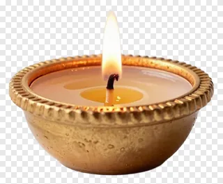 A lit diwali candle in a golden metal bowl.