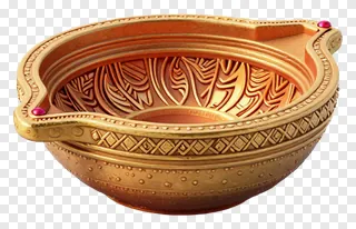 A golden diya with decorative patterns and red gemstones.