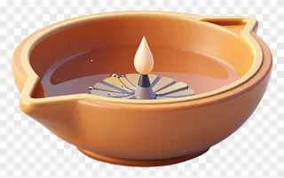 An orange ceramic diya with a flame floating in water.