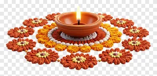 A lit terracotta diya surrounded by a floral rangoli design.