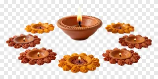 Circular arrangement of lit terracotta diyas.