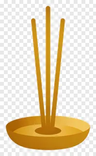 A golden incense holder with three incense sticks.