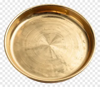 A polished brass Durga Puja thali shown from above.