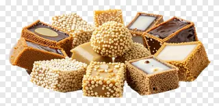 A collection of assorted Indian sweets with different coatings and fillings.