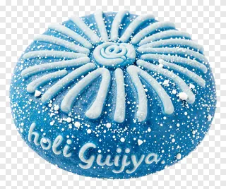 A blue Holi gujiya sweet with white icing and sprinkles.