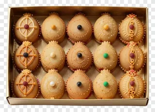 Box containing decorative Indian festival sweets for Diwali.