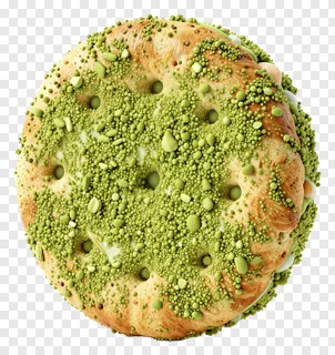 Round rice cracker dusted with green matcha powder.