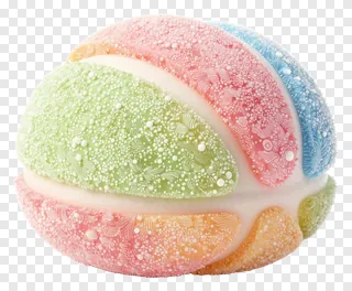 A colorful, layered til ladoo sweet with floral designs.