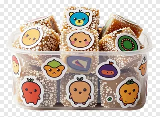 A box of Indian sweets decorated with cute cartoon stickers.