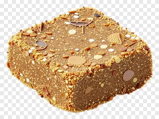 A single kaju katli sweet with textured decoration.