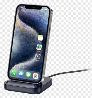 A smartphone charging on a stand.