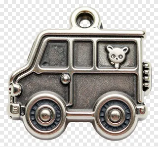 Metallic tin toy truck charm with bear face.