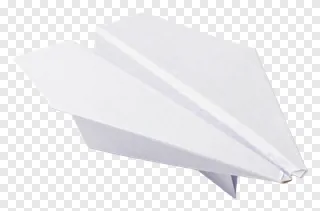 A white paper airplane flying through the air.